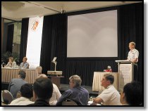 USCG Capt. Ray Miller takes a question from a conference delegate