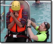 Brian Horner of Learn To Return Training Systems instructs a student in the pool