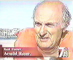 Arnold Rowe being interviewed for TV news